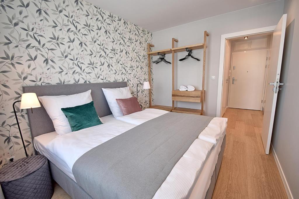 Posteľ alebo postele v izbe v ubytovaní Apartament PIER 72 PREMIUM