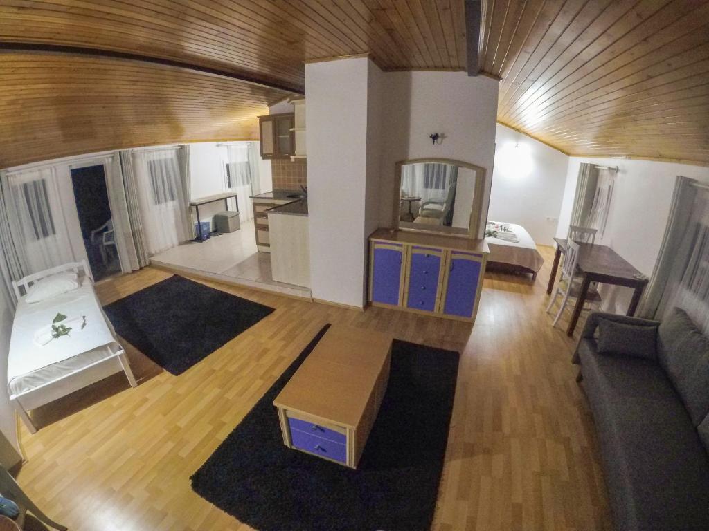 Postel nebo postele na pokoji v ubytování Kaizen Gate Hotel