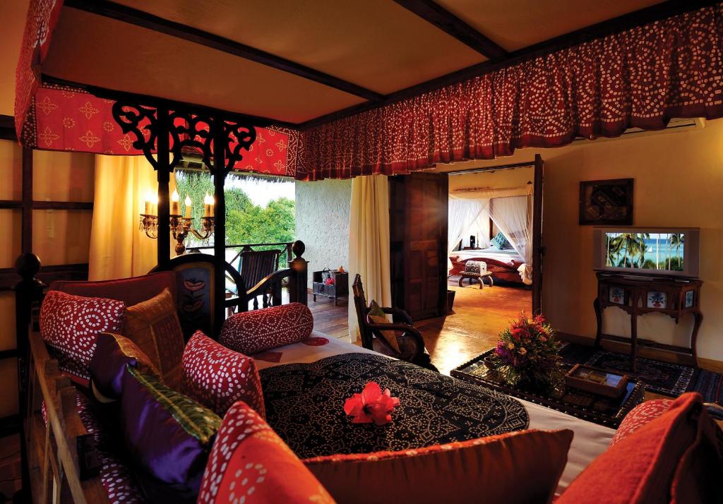 TV a/nebo společenská místnost v ubytování Neptune Pwani Beach Resort & Spa Zanzibar - All Inclusive