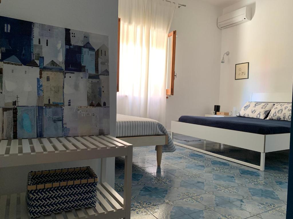 Кровать или кровати в номере Casa Vacanze Astori