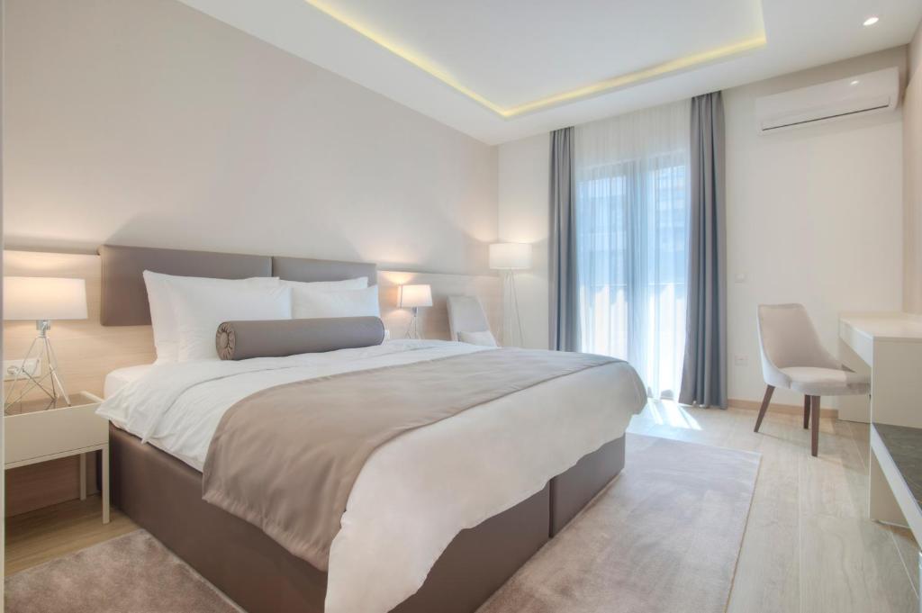 Postel nebo postele na pokoji v ubytování Hotel Vela