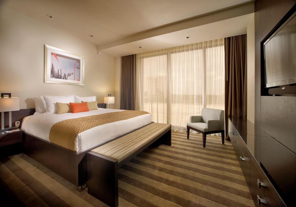 Postel nebo postele na pokoji v ubytování EB Hotel Miami Airport