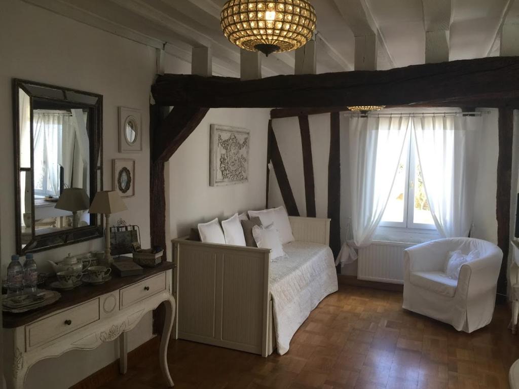 Postel nebo postele na pokoji v ubytování B&B les Agapanthes