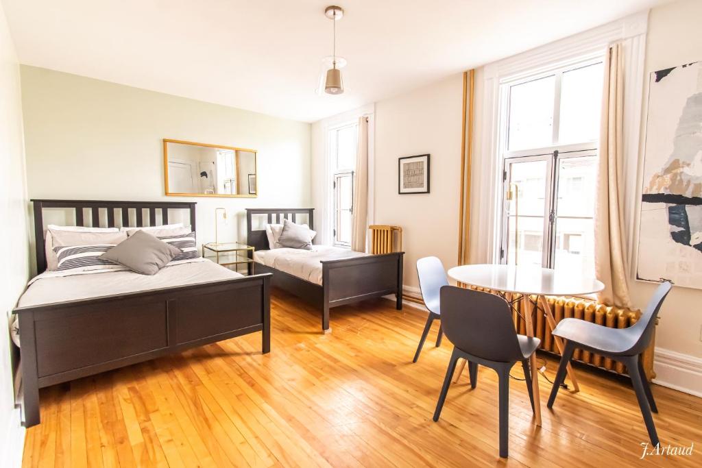 Postel nebo postele na pokoji v ubytování Auberge du Plateau