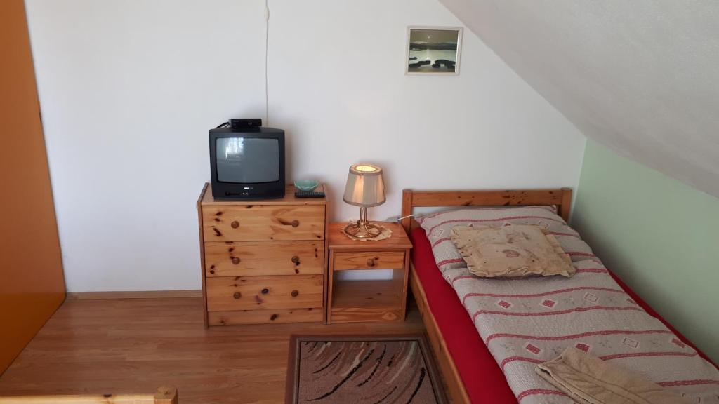 Postel nebo postele na pokoji v ubytování Penzion Hugo