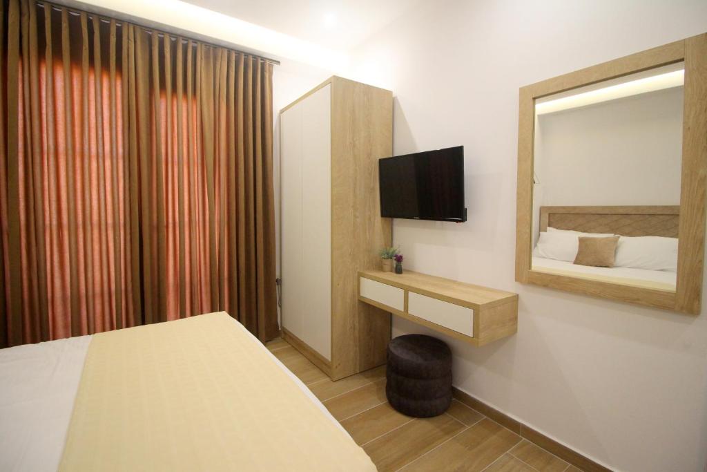 TV a/nebo společenská místnost v ubytování Hotel Sunway