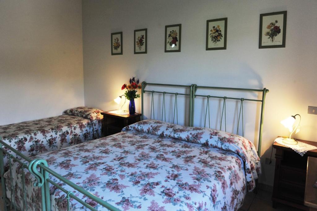 Posteľ alebo postele v izbe v ubytovaní Agriturismo La Caputa