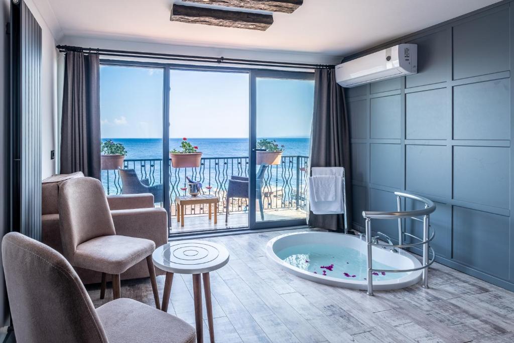 Χώρος καθιστικού στο Assos Kervansaray Hotel - Special Category