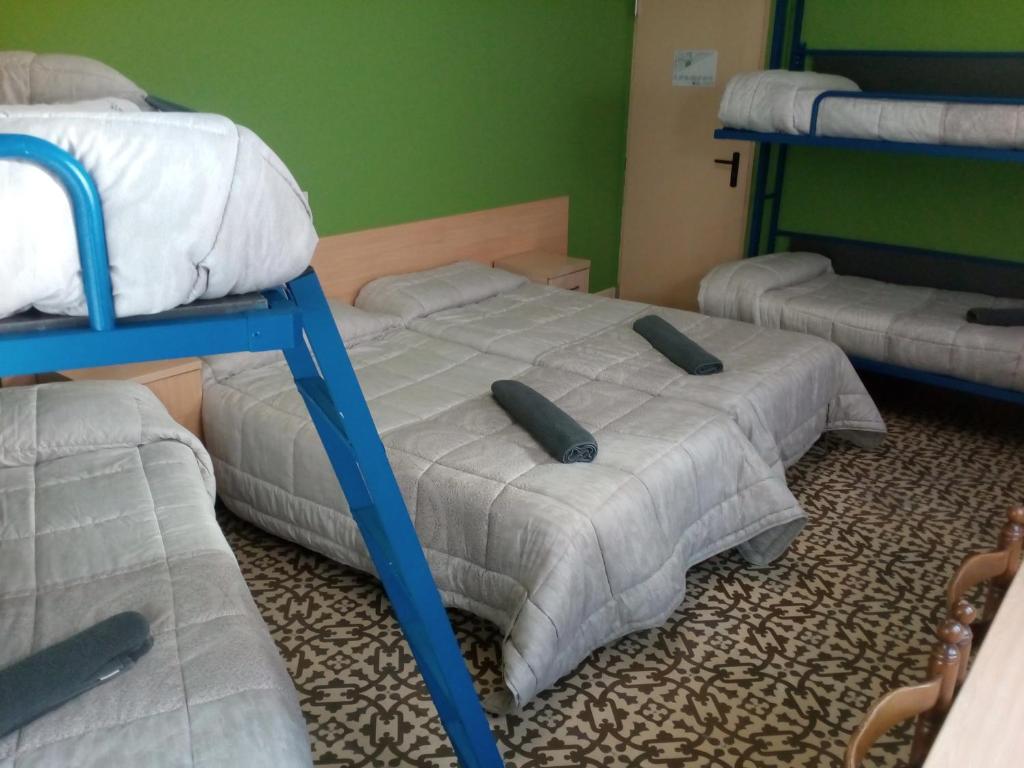 Postel nebo postele na pokoji v ubytování Alberg SPRINT