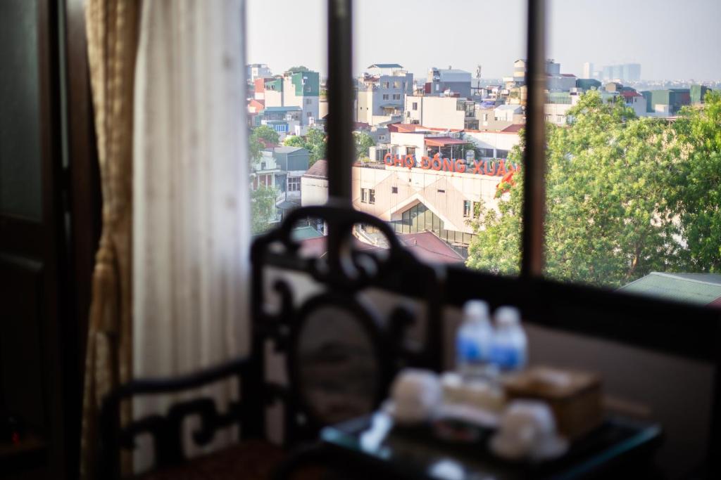 Balkón nebo terasa v ubytování Hanoi Little Town Hotel