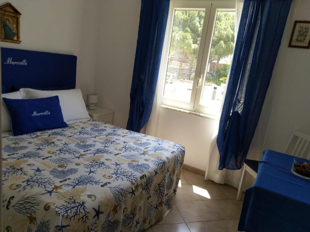 Postel nebo postele na pokoji v ubytování La Marocella
