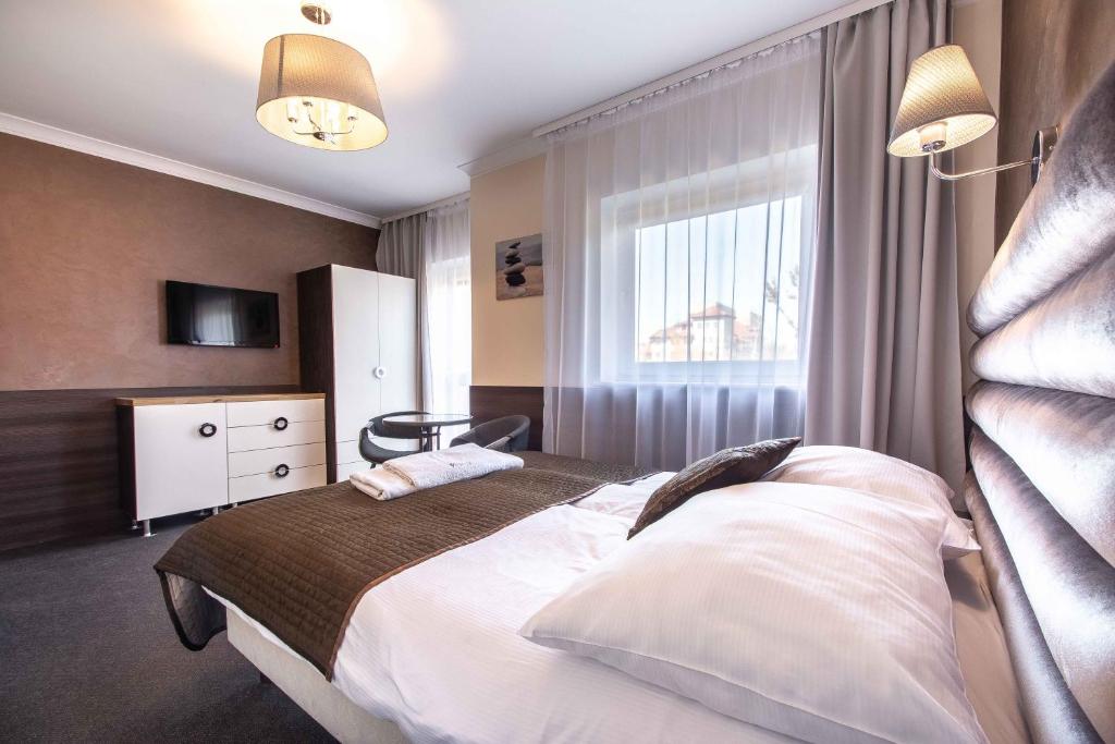 Posteľ alebo postele v izbe v ubytovaní Villa 33 Blisko Plaży