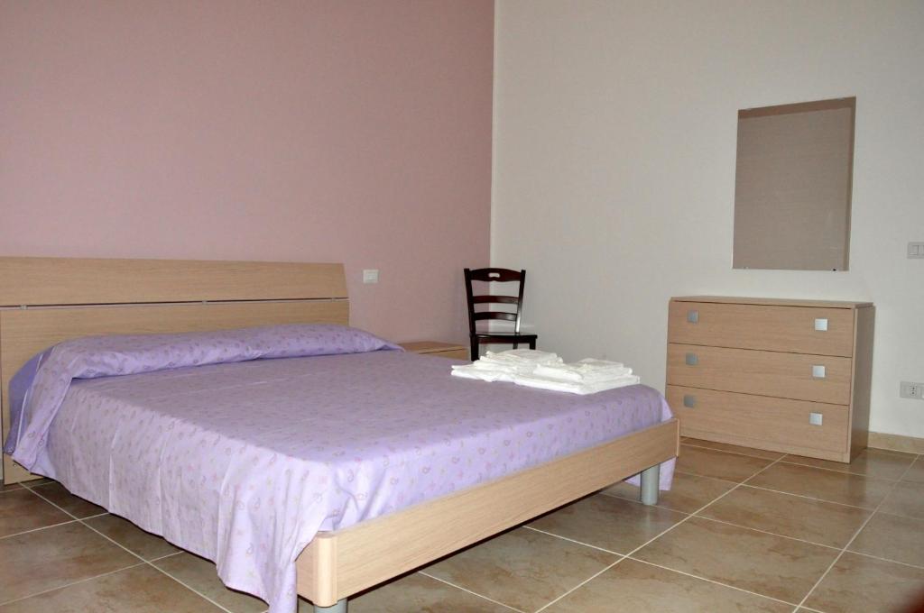 Postel nebo postele na pokoji v ubytování Casa Vacanze Eufemia