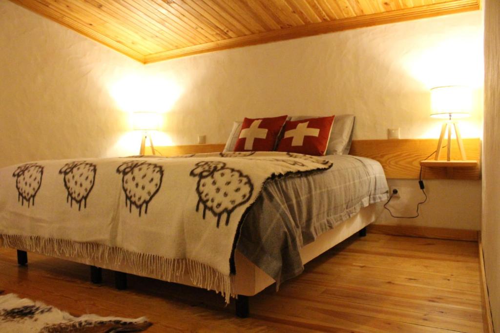 Postel nebo postele na pokoji v ubytování Casa do Tio João