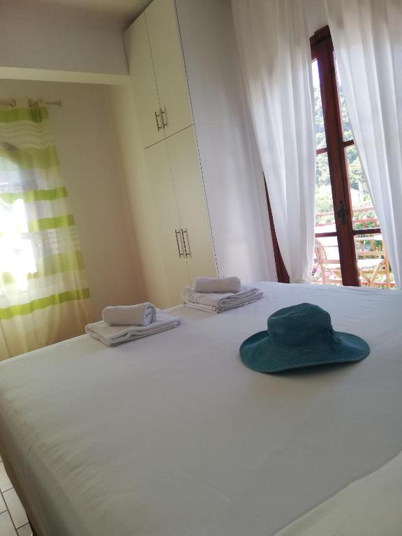 Postel nebo postele na pokoji v ubytování Villa Mikra Asia