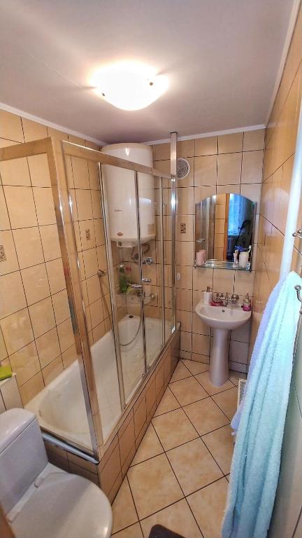 Kúpeľňa v ubytovaní Domek nad morzem Wisełka