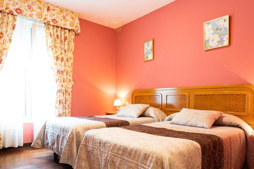 Cama o camas de una habitación en Alojamiento Calzada Romana