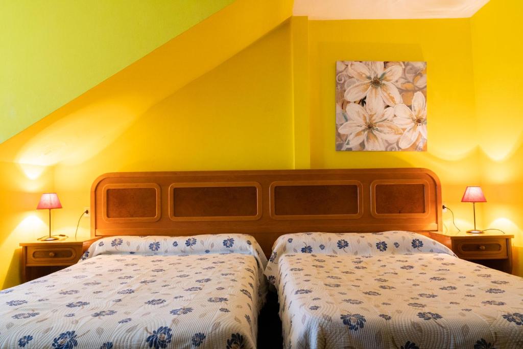 Cama o camas de una habitación en Alojamiento Calzada Romana