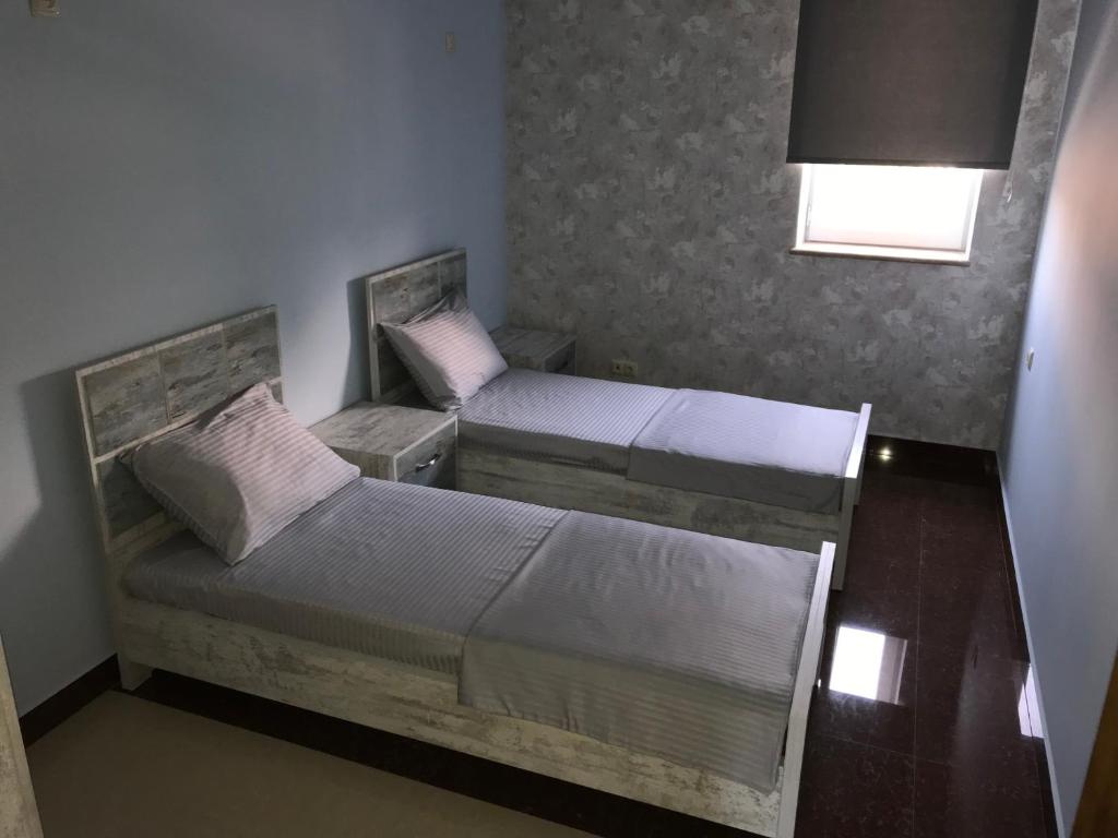 Postel nebo postele na pokoji v ubytování Liko Hostel