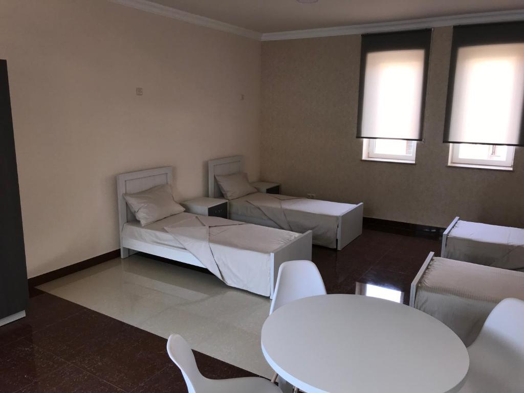 Postel nebo postele na pokoji v ubytování Liko Hostel