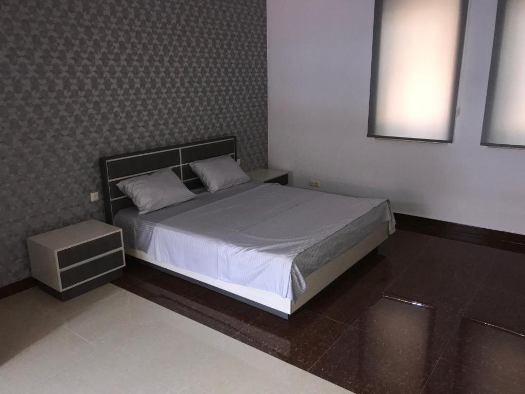 Postel nebo postele na pokoji v ubytování Liko Hostel