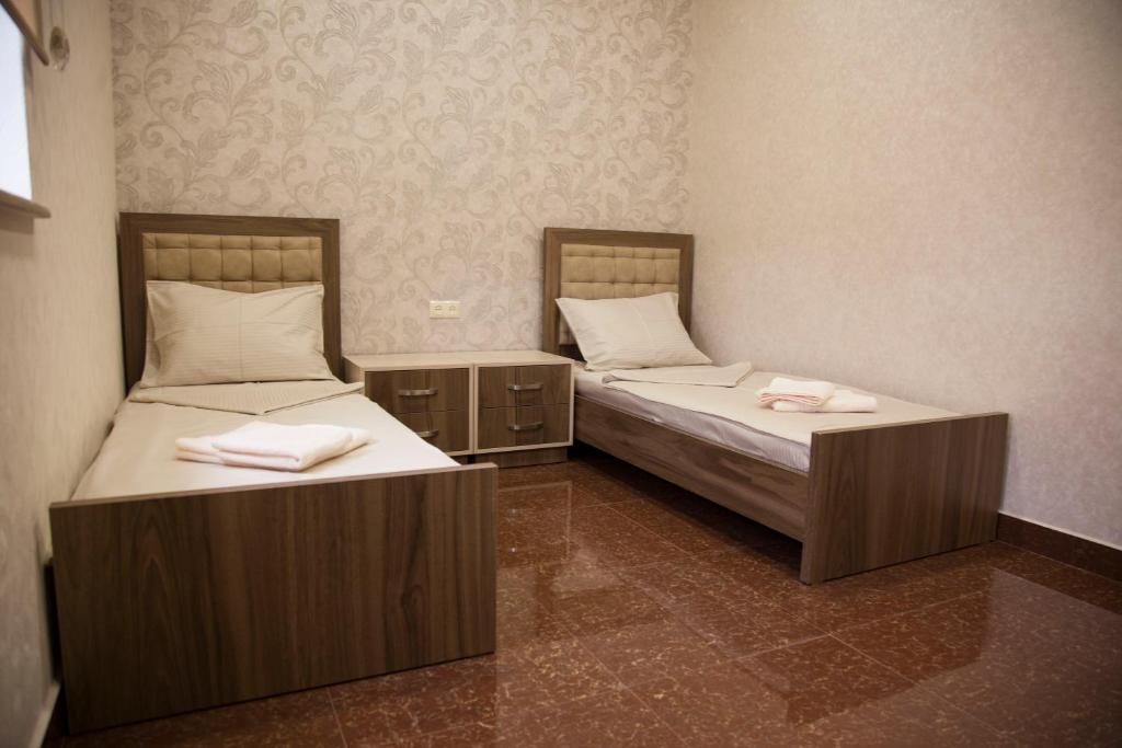 Postel nebo postele na pokoji v ubytování Liko Hostel