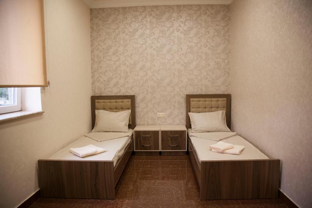 Postel nebo postele na pokoji v ubytování Liko Hostel
