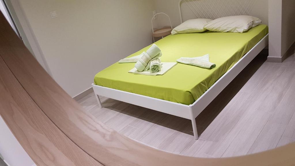 Кровать или кровати в номере Anthia House