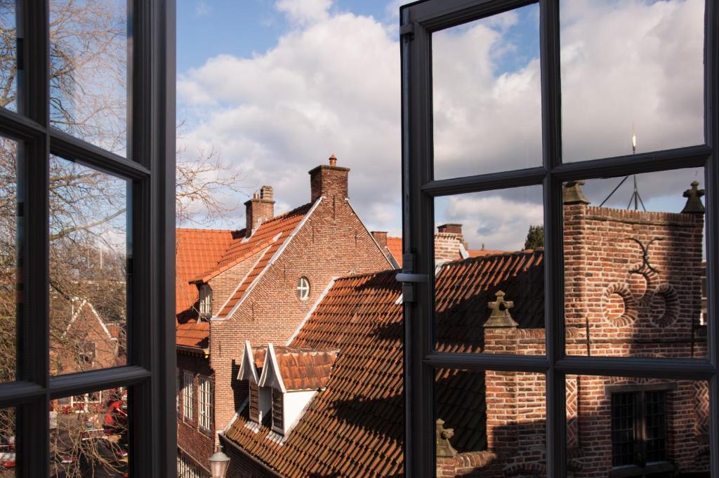 a view from a window of a building at Long John's Pub & Hotel in Amersfoort