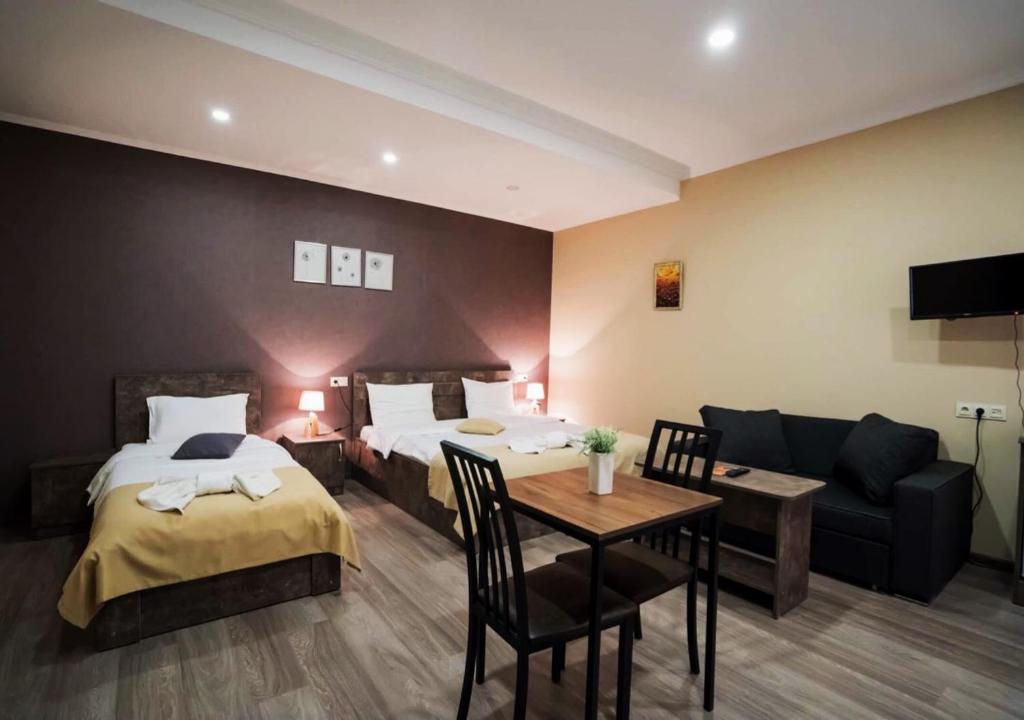 Postel nebo postele na pokoji v ubytování Hotel Nabadi
