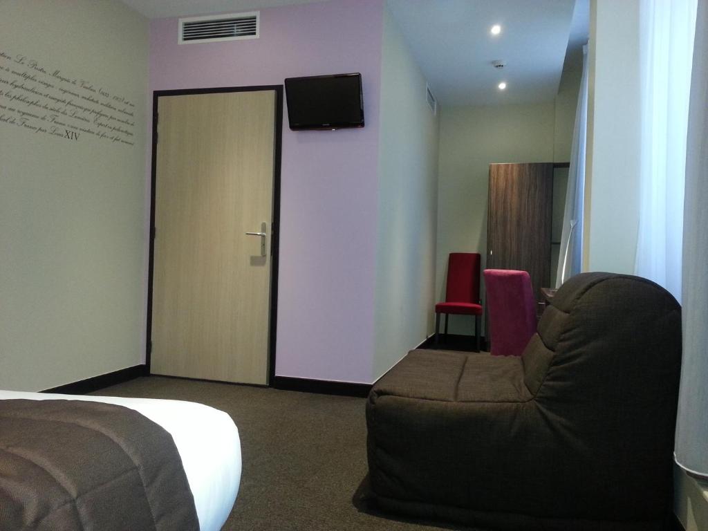 TV a/nebo společenská místnost v ubytování Hotel Vauban