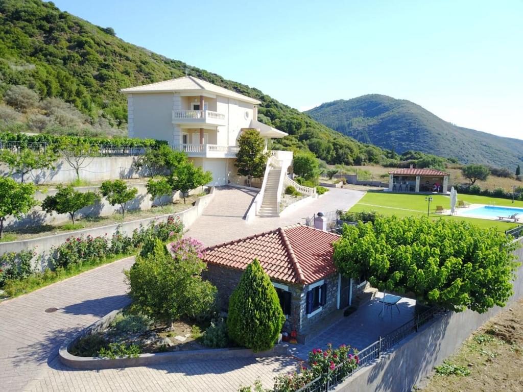 an aerial view of a house with a pool at Villa Anna in Nafpaktos
