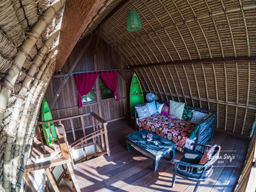 an overhead view of a living room in a yurt at Kuda Laut Bungalows & Diving in Pemuteran