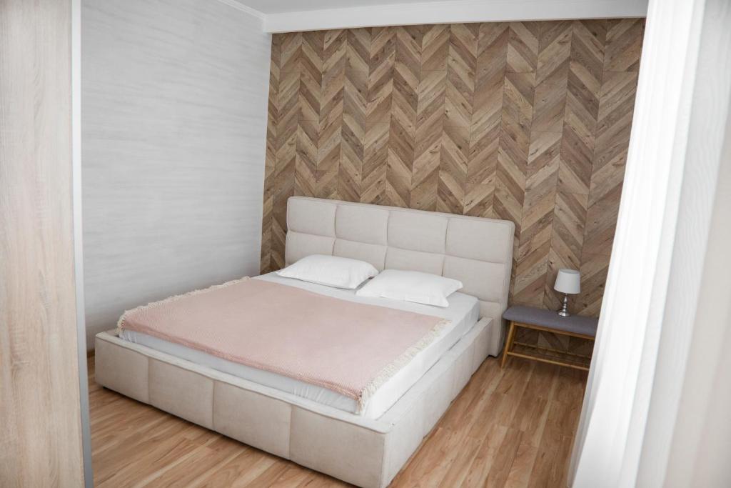 Postel nebo postele na pokoji v ubytování VIP Hotel