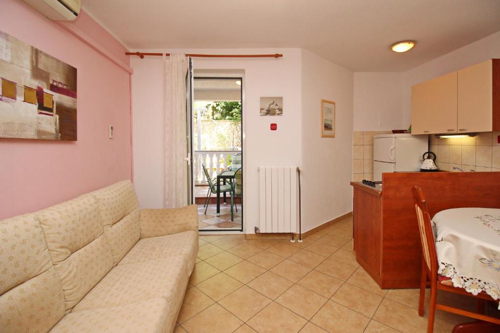 Kuchyň nebo kuchyňský kout v ubytování Apartments Alex
