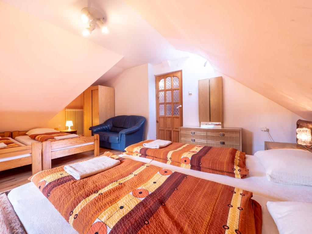 Postel nebo postele na pokoji v ubytování Apartamenty Maria