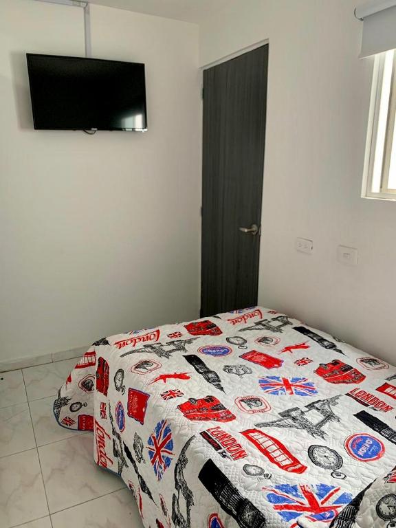 Postel nebo postele na pokoji v ubytování Aloha Hostel