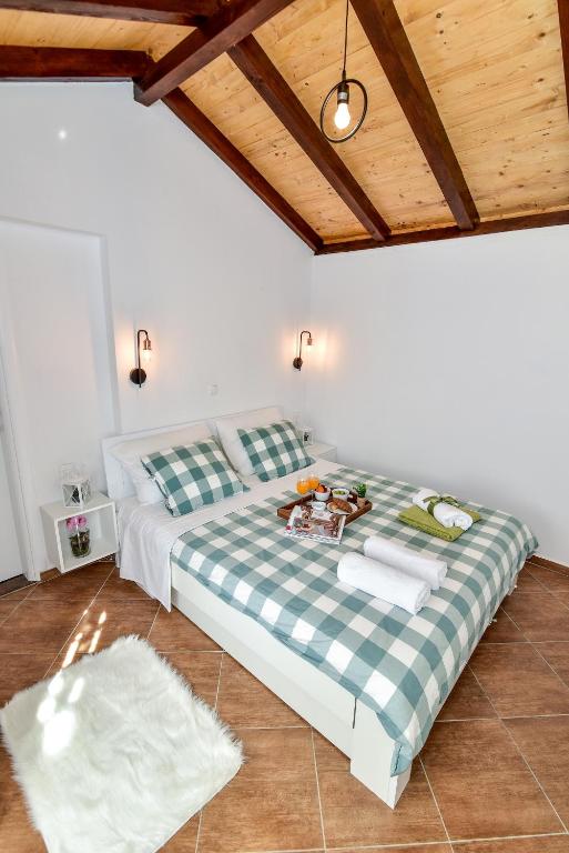 Łóżko lub łóżka w pokoju w obiekcie Apartman Mare
