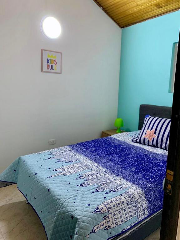 Postel nebo postele na pokoji v ubytování Aloha Hostel