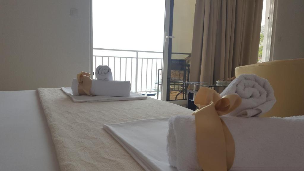 Postel nebo postele na pokoji v ubytování Rooms Florida