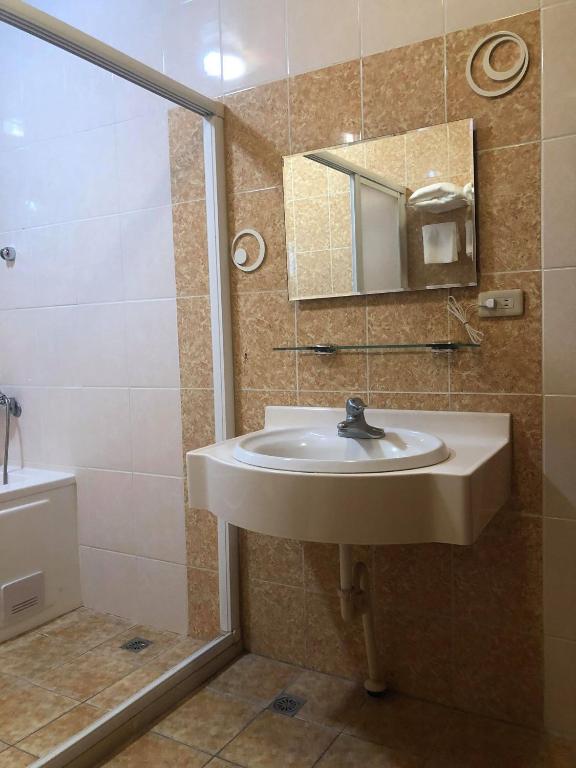 Koupelna v ubytování Yiyue Guanhe Homestay 倚月觀荷民宿