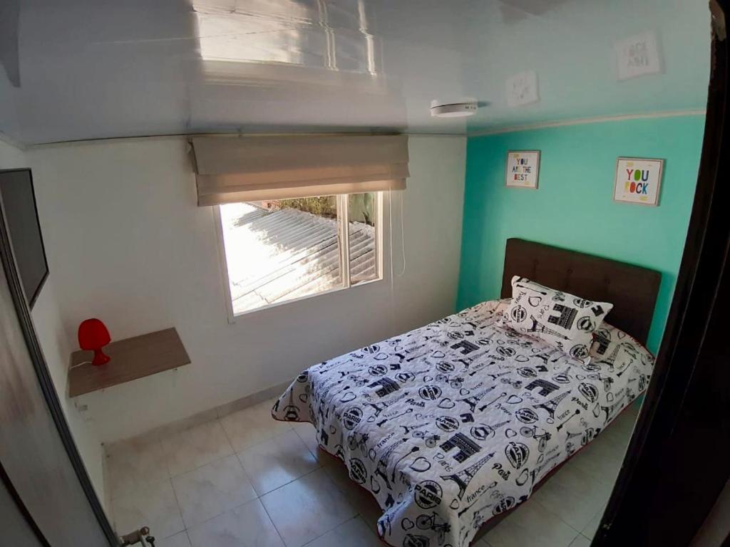 Postel nebo postele na pokoji v ubytování Aloha Hostel