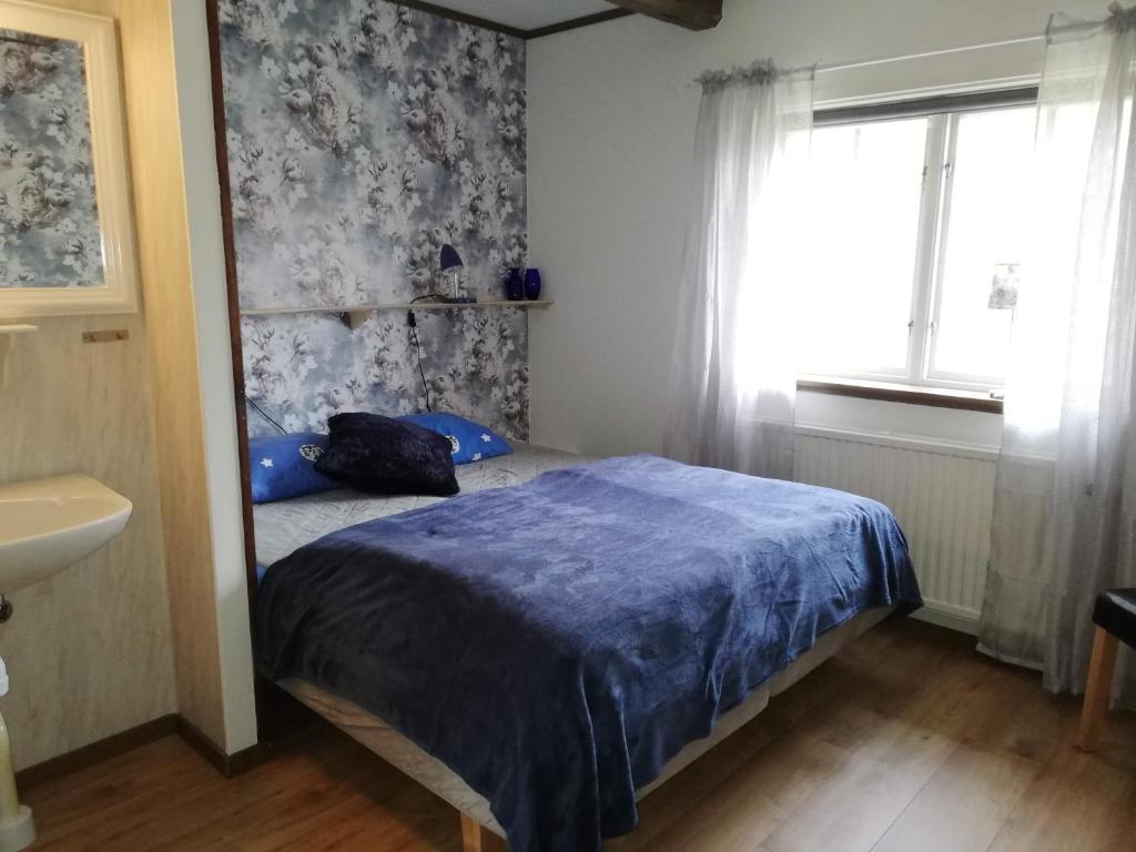 STF Långasjö Vandrarhem - Habitación Cuádruple Con Baño Compartido