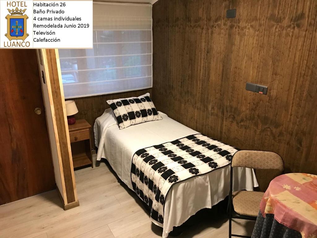 Postel nebo postele na pokoji v ubytování Hotel Luanco