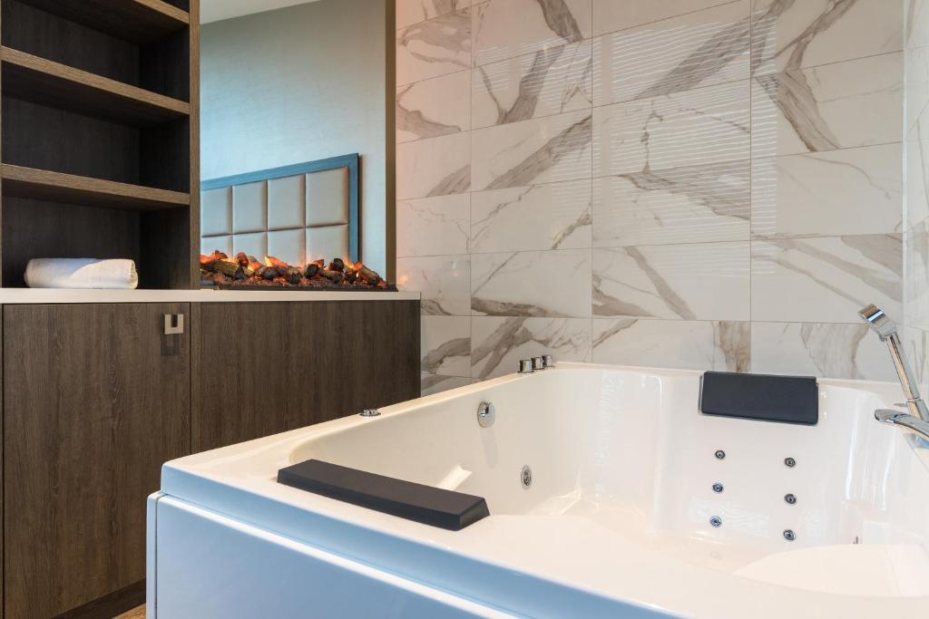 Koupelna v ubytování Riva hotel Den Haag - Delft