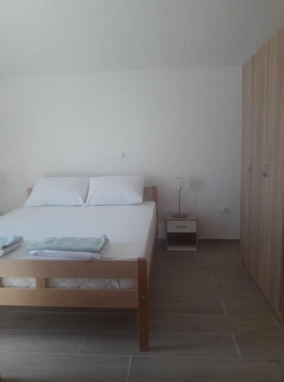Posteľ alebo postele v izbe v ubytovaní Apartments Radica