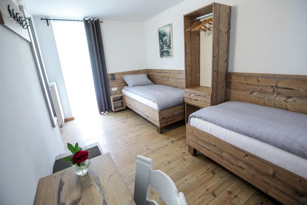 Postel nebo postele na pokoji v ubytování Hiša Poljana Rooms