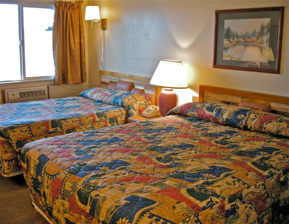 Postel nebo postele na pokoji v ubytování Royal Motor Inn