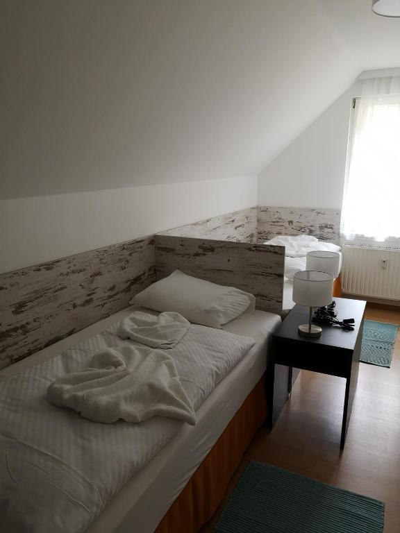 Posteľ alebo postele v izbe v ubytovaní GRASSEGGER APPARTEMENTHAUS
