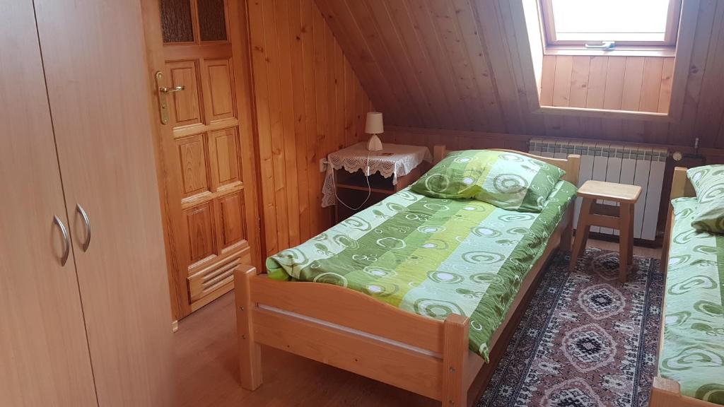 Posteľ alebo postele v izbe v ubytovaní Pokoje Gościnne u Cześka